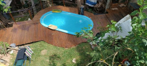 Casa para família curtir o Verao na praia de Cabecudas com piscina e quintal amplo